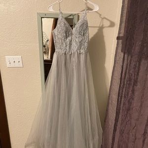 Worn one time for an hour, very lovely and flattering!